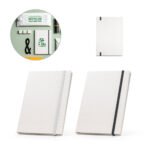 Caderno A5,produzido através de pacotes de leite reciclados com folhas pautadas recicladas, com 160 páginas pautadas recicladas